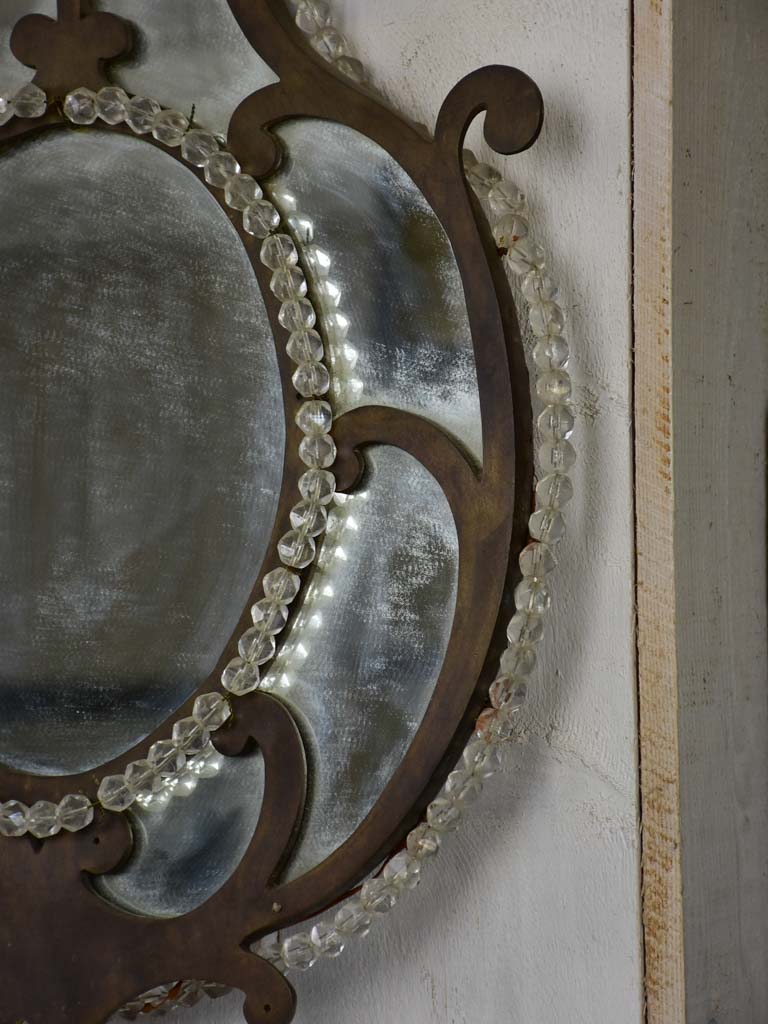 Pair of early 19th-century wrought iron Italian mirrors with beading