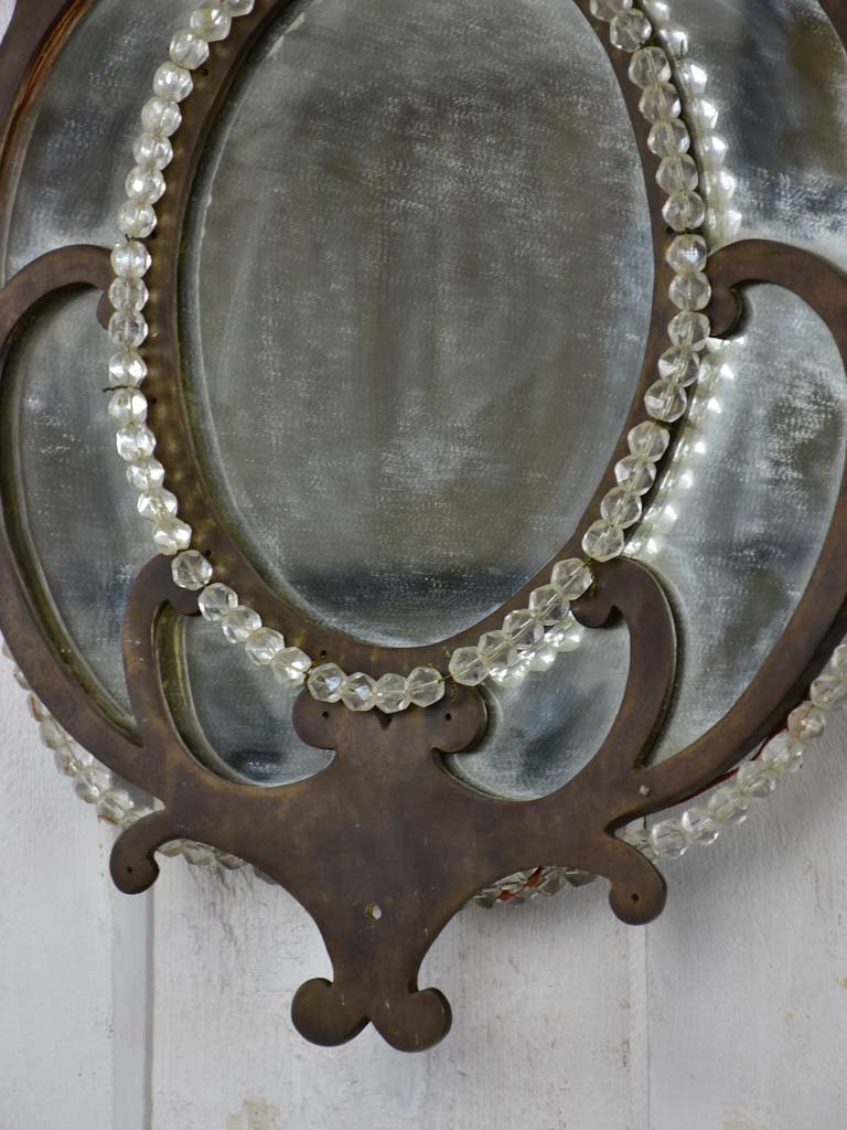 Pair of early 19th-century wrought iron Italian mirrors with beading