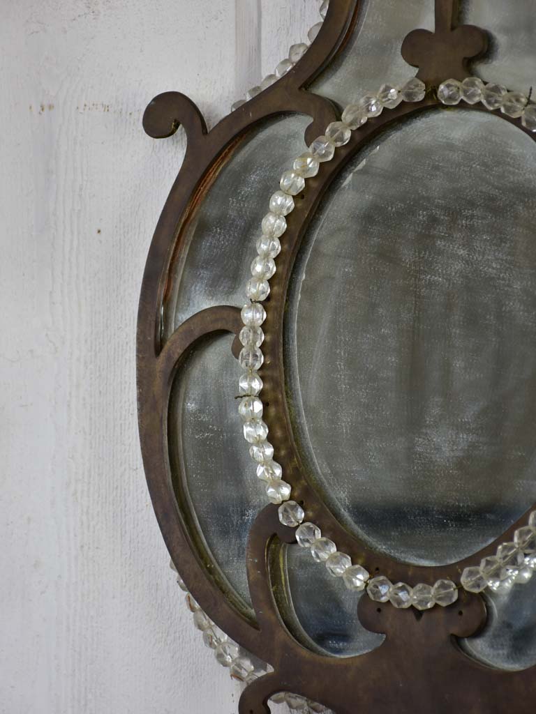 Pair of early 19th-century wrought iron Italian mirrors with beading