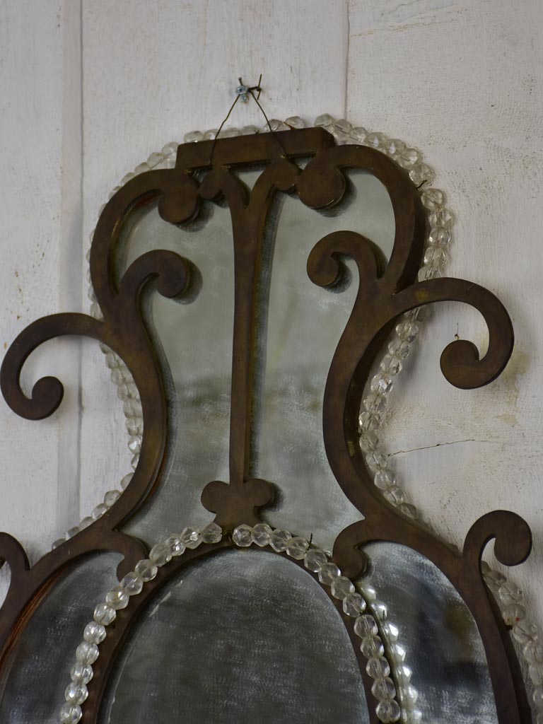 Pair of early 19th-century wrought iron Italian mirrors with beading