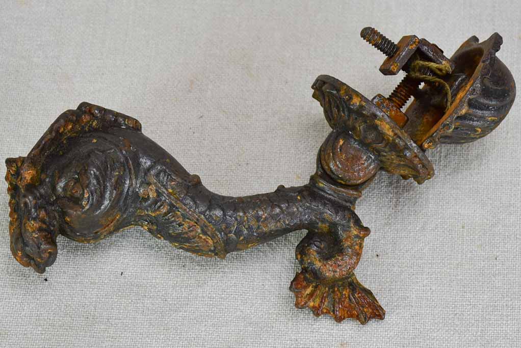 Antique cast iron door knocker dolphin and shell motif