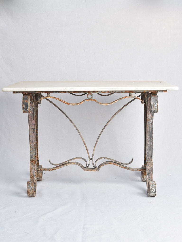 1950s marble presentation table, wrought iron base