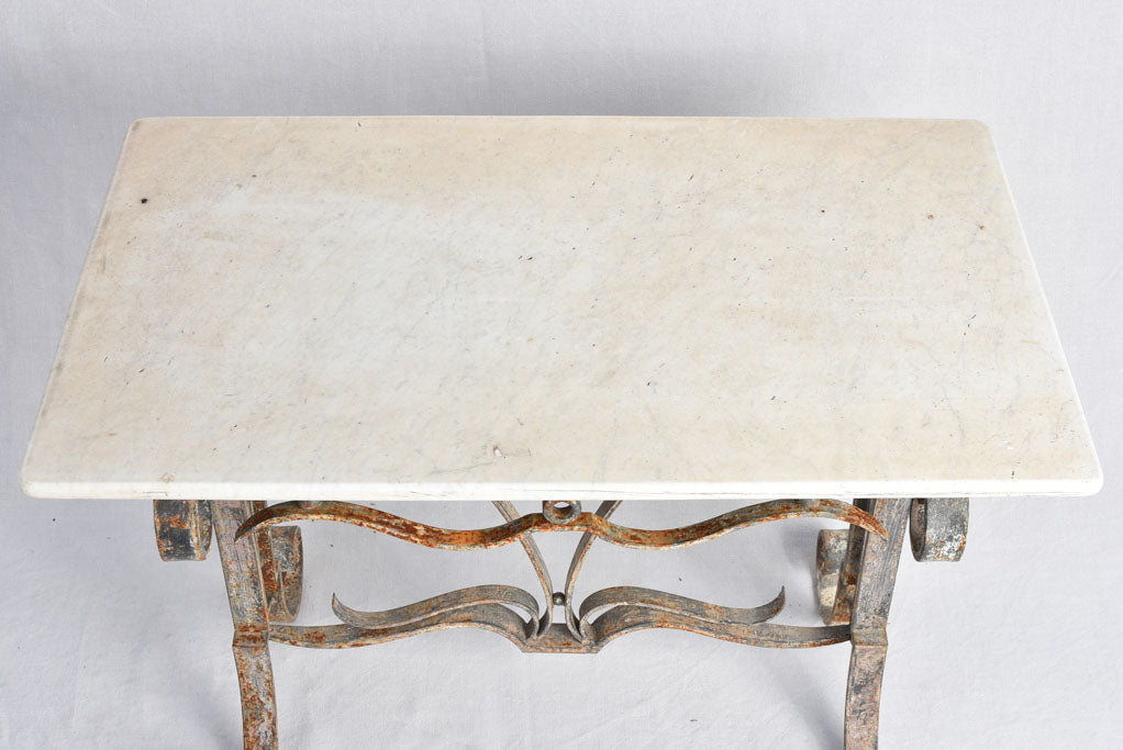 1950s marble presentation table, wrought iron base