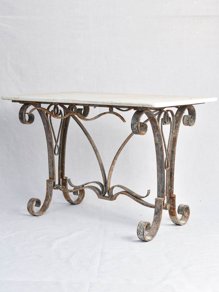 1950s marble presentation table, wrought iron base