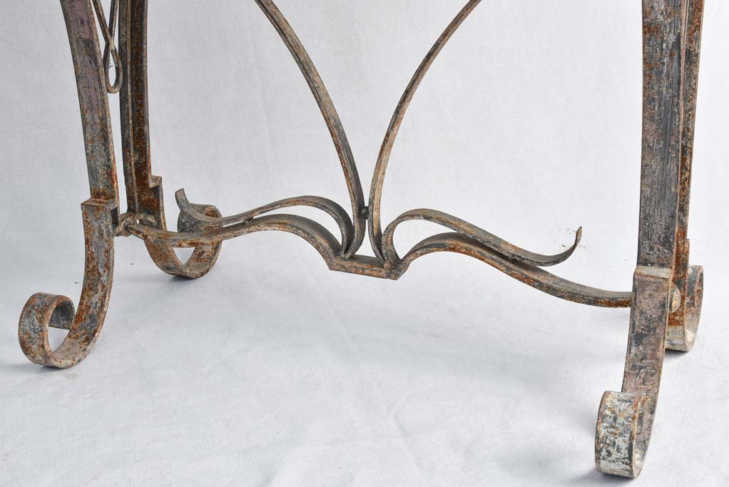 1950s marble presentation table, wrought iron base