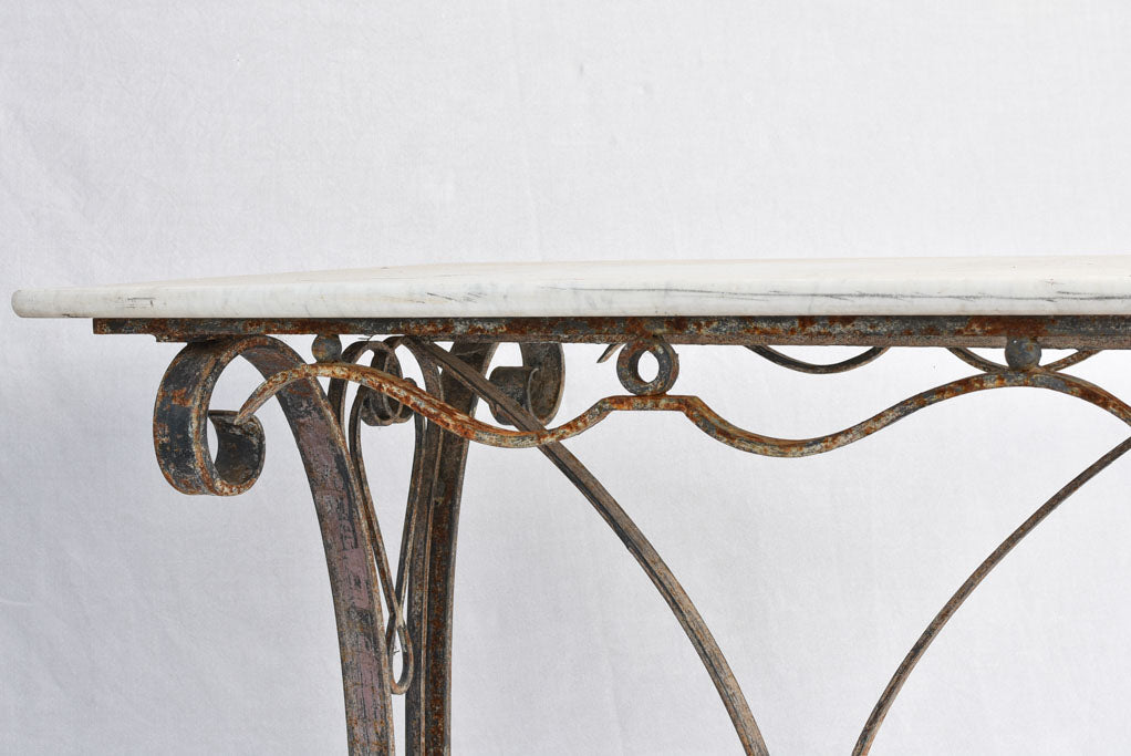 1950s marble presentation table, wrought iron base