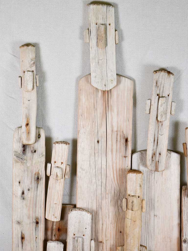 Driftwood totem sculpture by JP Dreano - 10 characters 55"