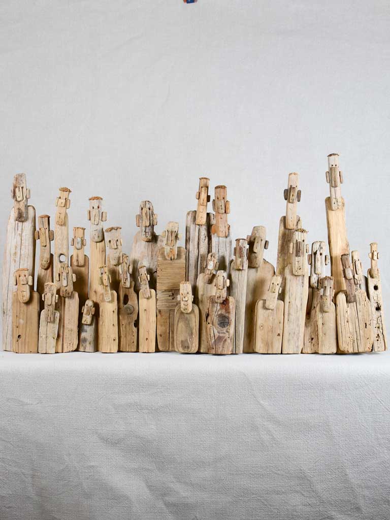 Panoramic driftwood sculpture by JP Dreano - 31 characters 28¾"