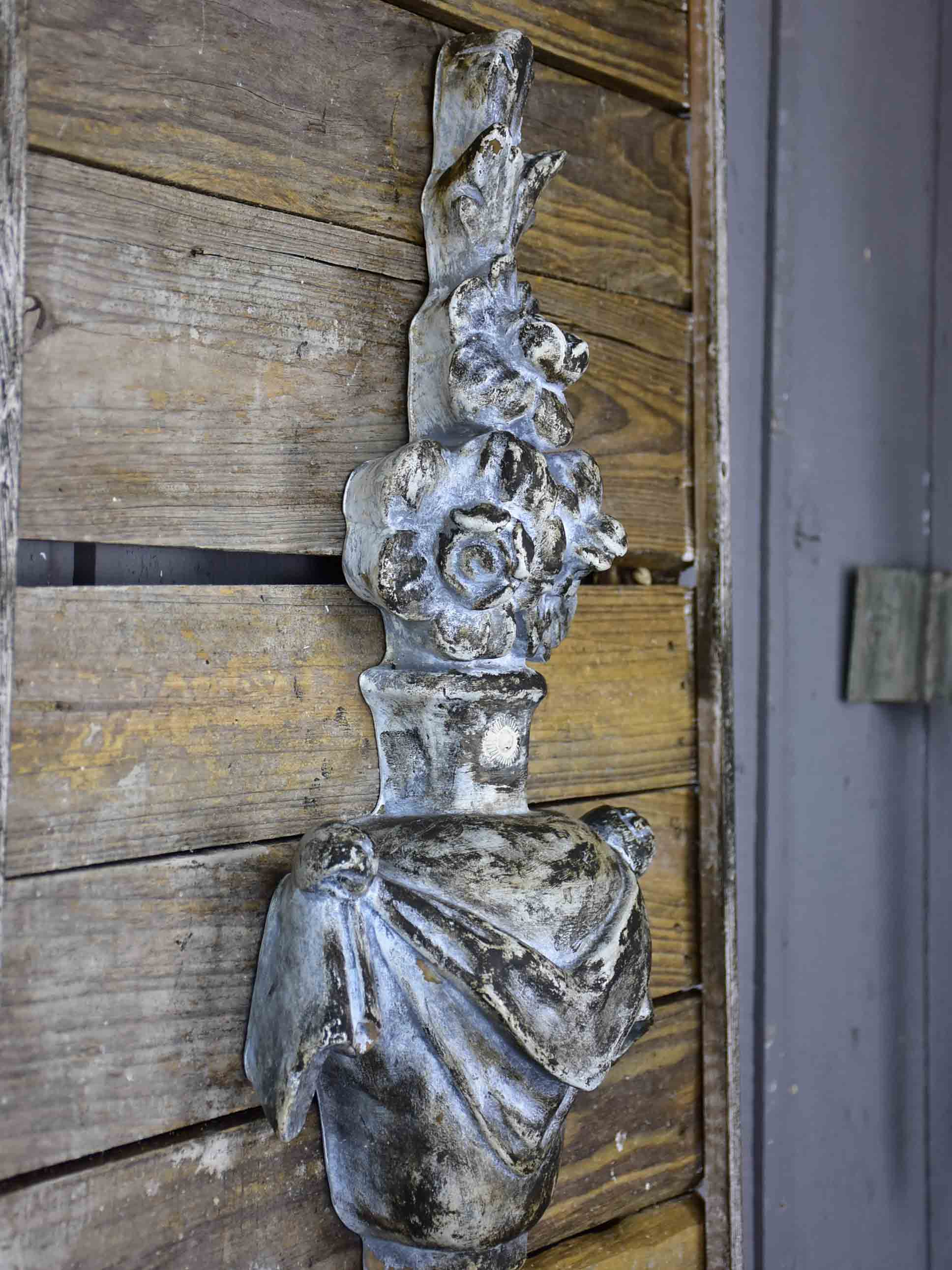 Pair of rustic French wall panels with flower urns