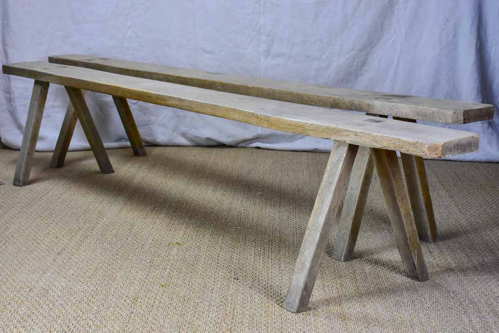 Pair of rustic antique French benches with splayed feet