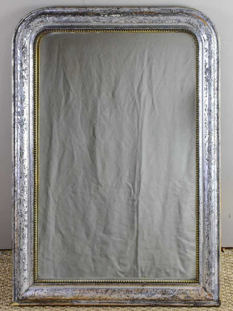 19th Century Louis Philippe mirror with timeworn silver / gold frame 25½" x 35¾"