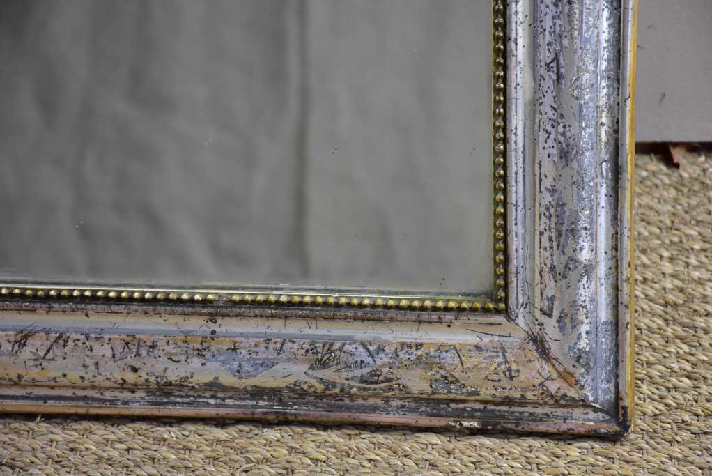 19th Century Louis Philippe mirror with timeworn silver / gold frame 25½" x 35¾"