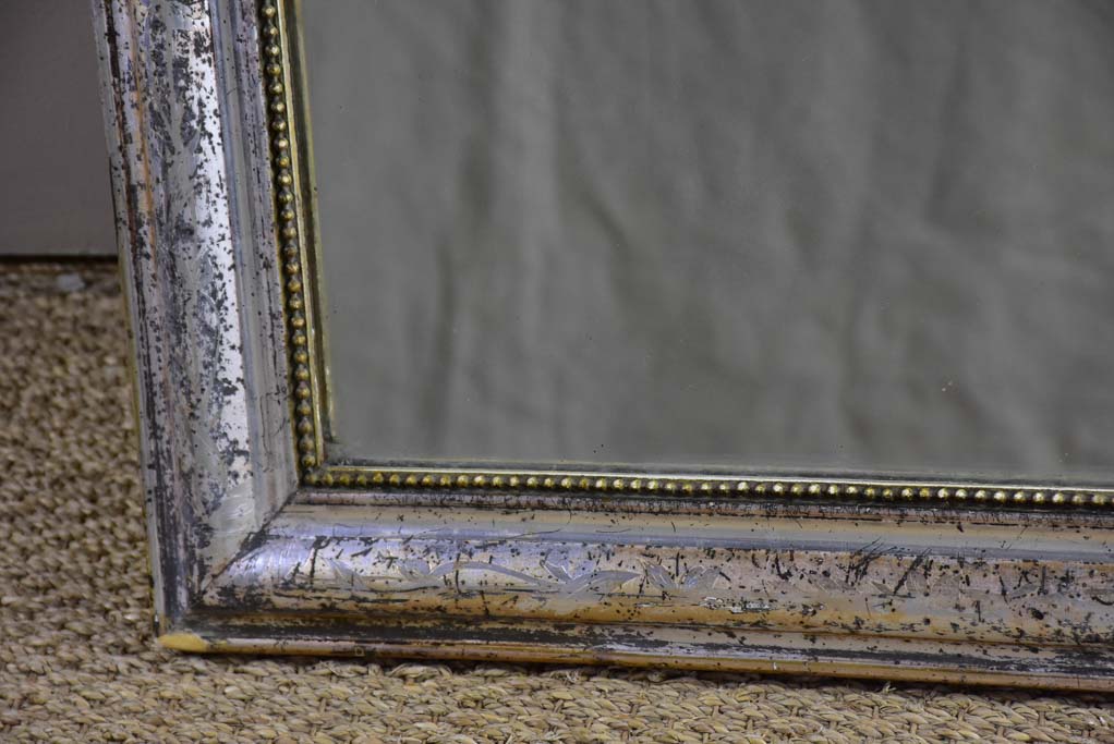 19th Century Louis Philippe mirror with timeworn silver / gold frame 25½" x 35¾"