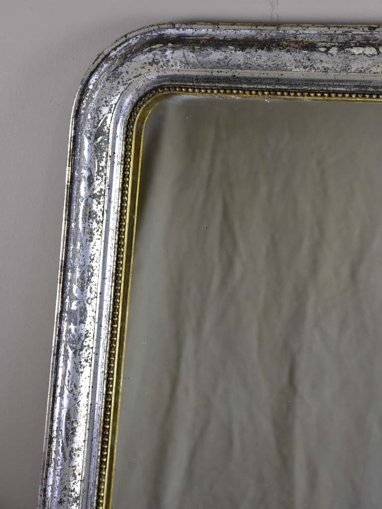 19th Century Louis Philippe mirror with timeworn silver / gold frame 25½" x 35¾"