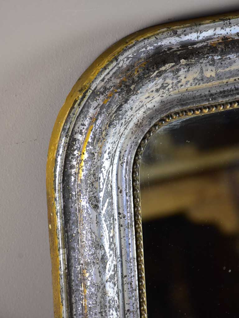 19th Century Louis Philippe mirror with timeworn silver / gold frame 25½" x 35¾"