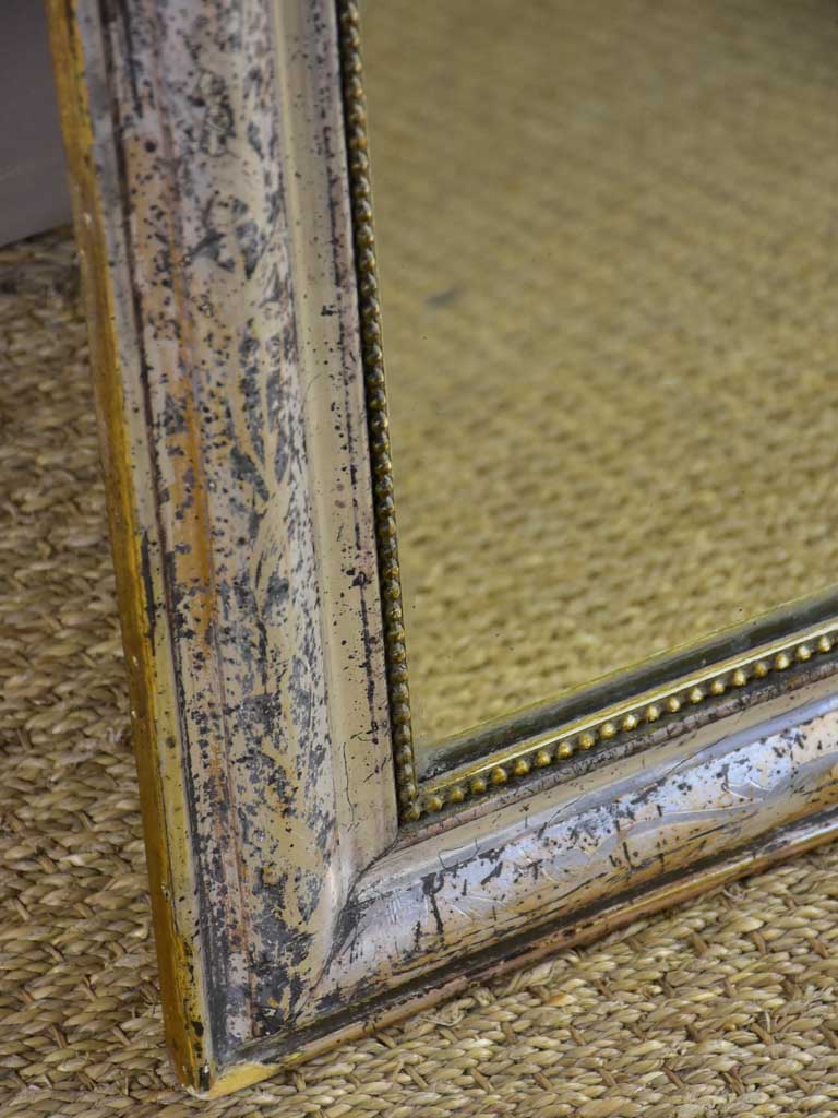 19th Century Louis Philippe mirror with timeworn silver / gold frame 25½" x 35¾"