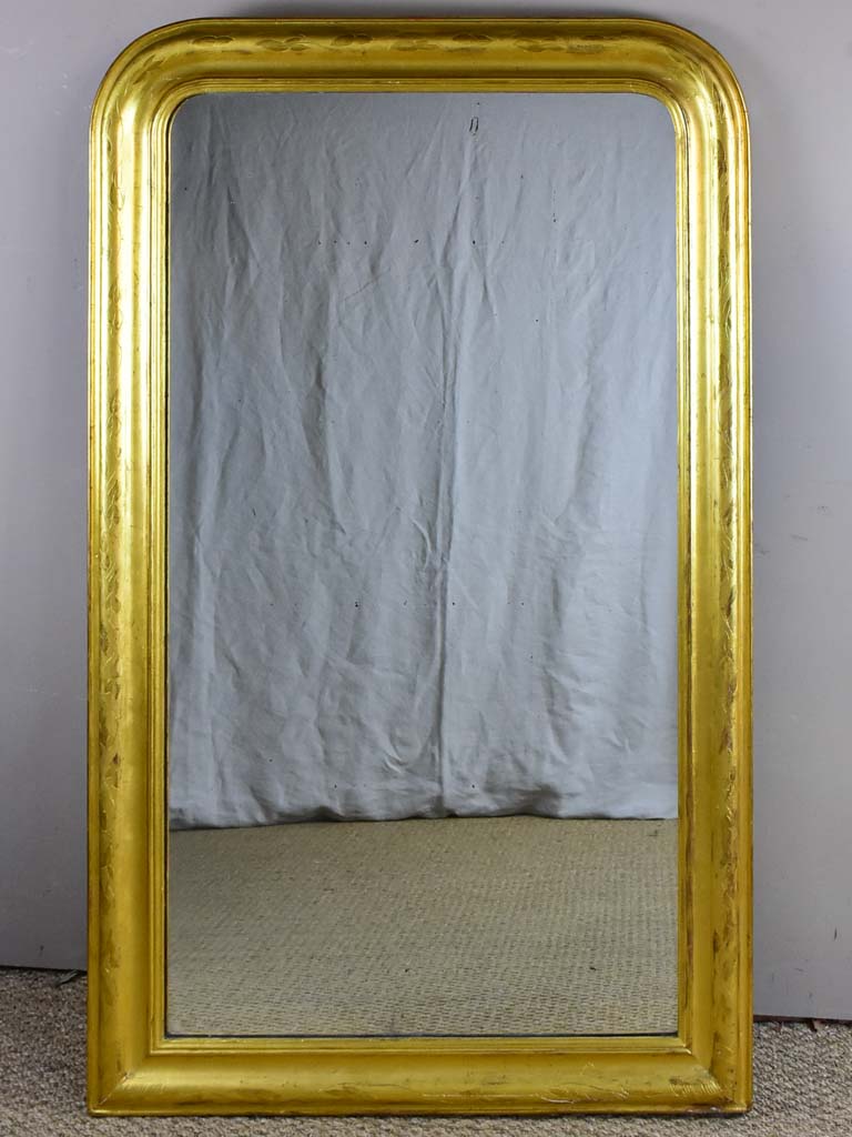 Large gilded Louis Philippe mirror from the 19th Century with simple frame 32¾" x 54¾"