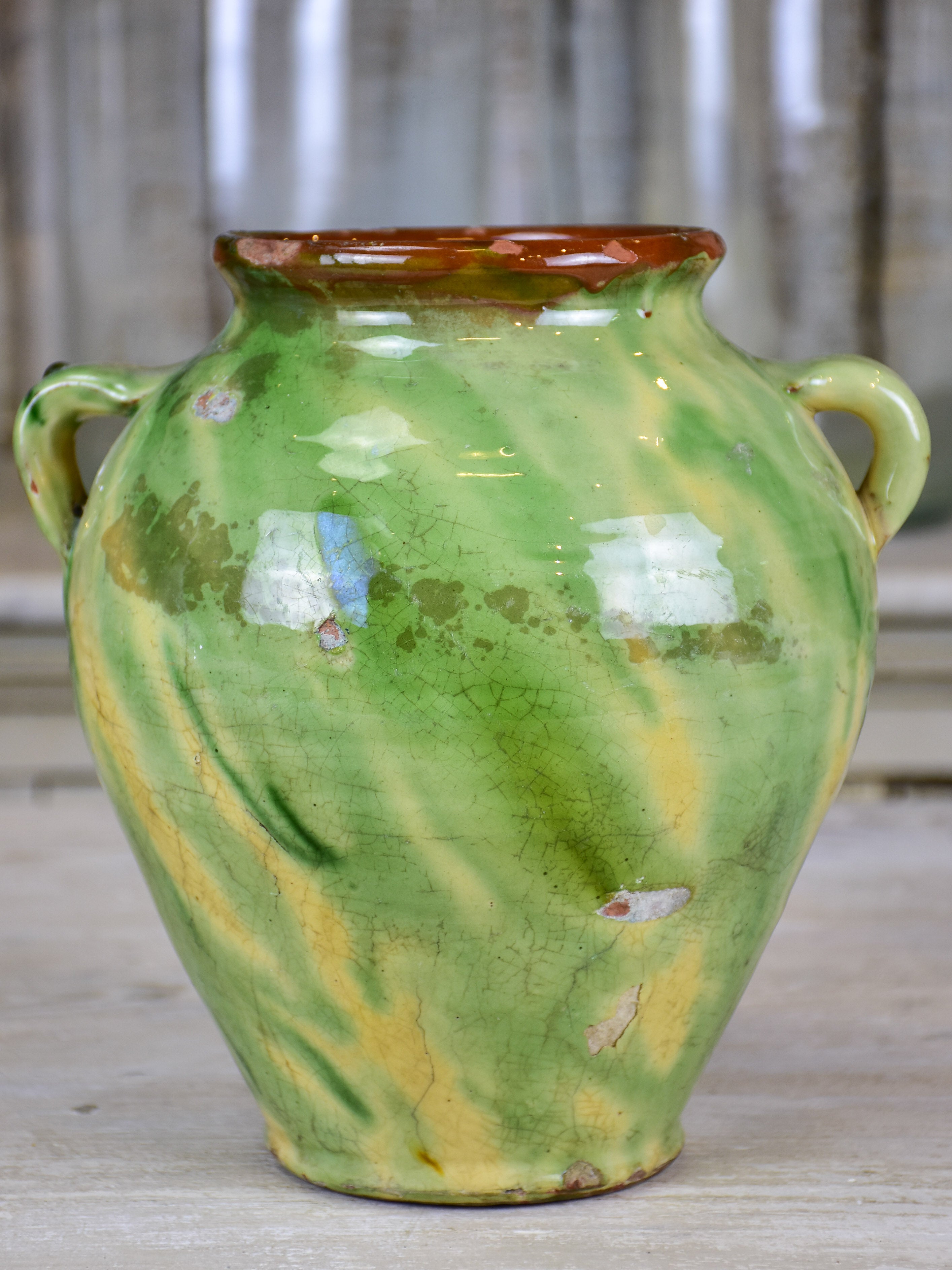 Antique confit pot with yellow and green glaze