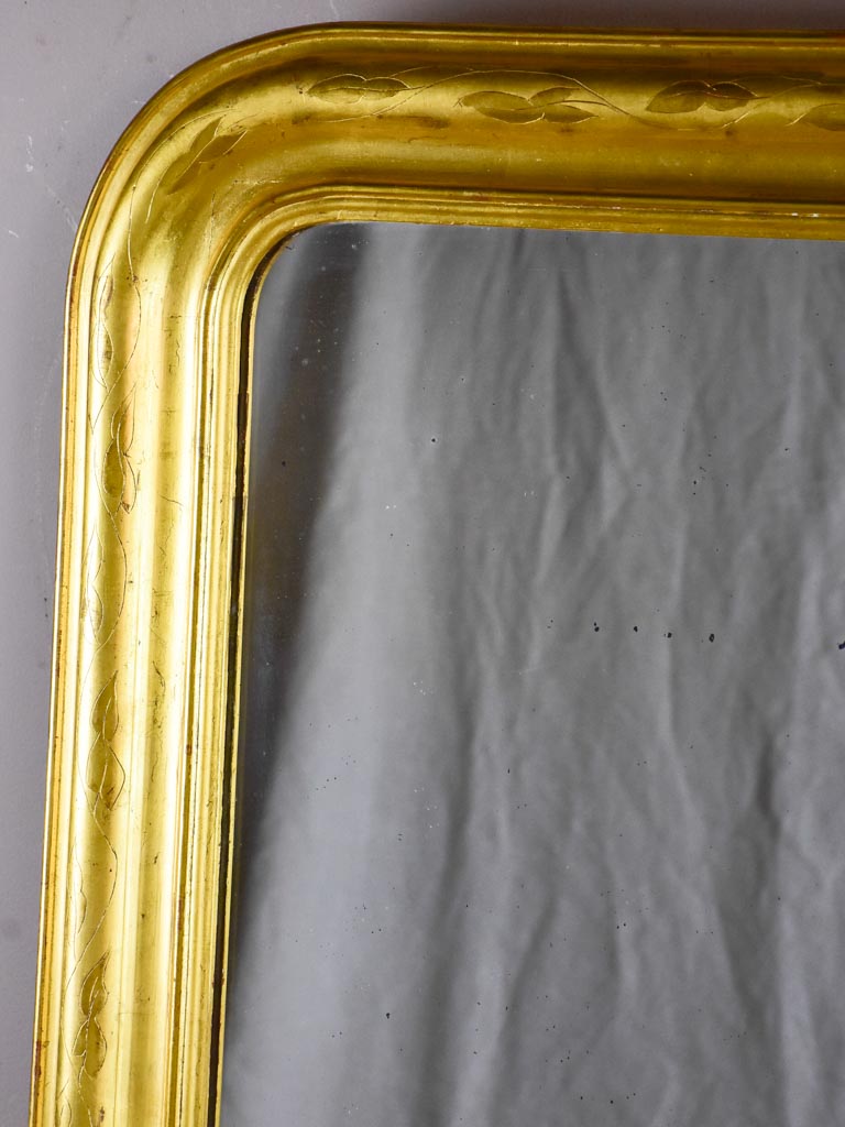 Large gilded Louis Philippe mirror from the 19th Century with simple frame 32¾" x 54¾"