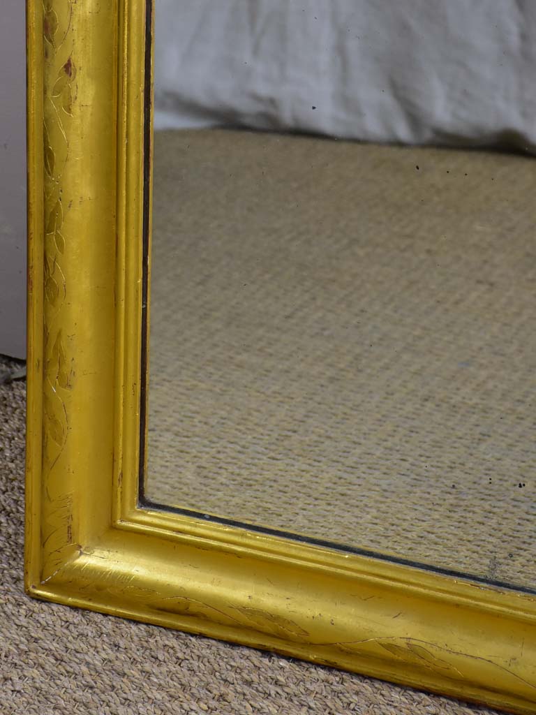 Large gilded Louis Philippe mirror from the 19th Century with simple frame 32¾" x 54¾"