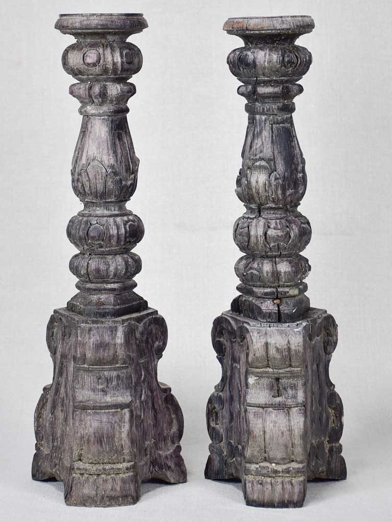 Pair of rustic carved candlesticks with charcoal patina 15¾"