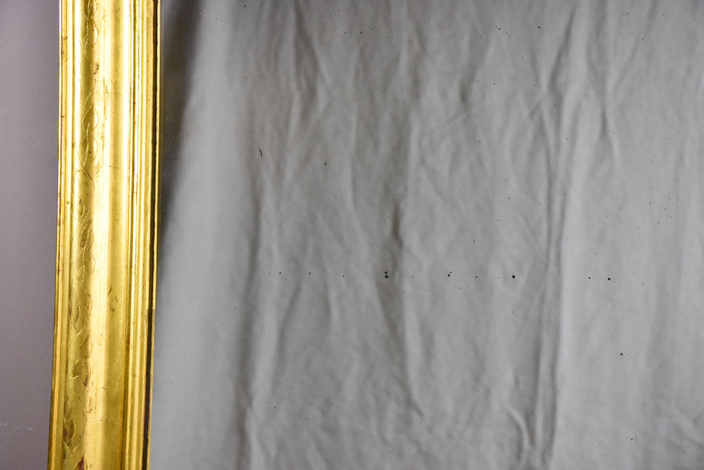 Large gilded Louis Philippe mirror from the 19th Century with simple frame 32¾" x 54¾"