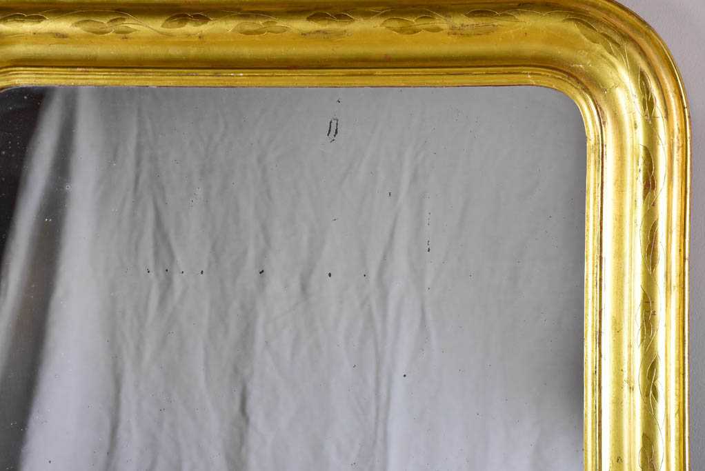 Large gilded Louis Philippe mirror from the 19th Century with simple frame 32¾" x 54¾"