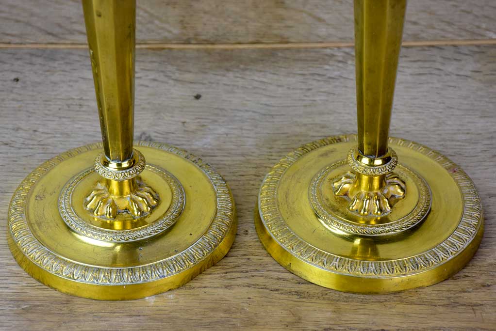 Pair of early 19th Century bronze candlesticks with claw feet