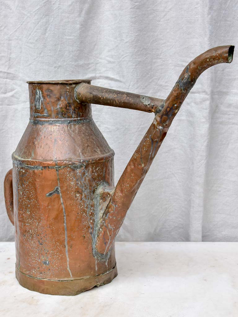 Rustic antique French copper watering can