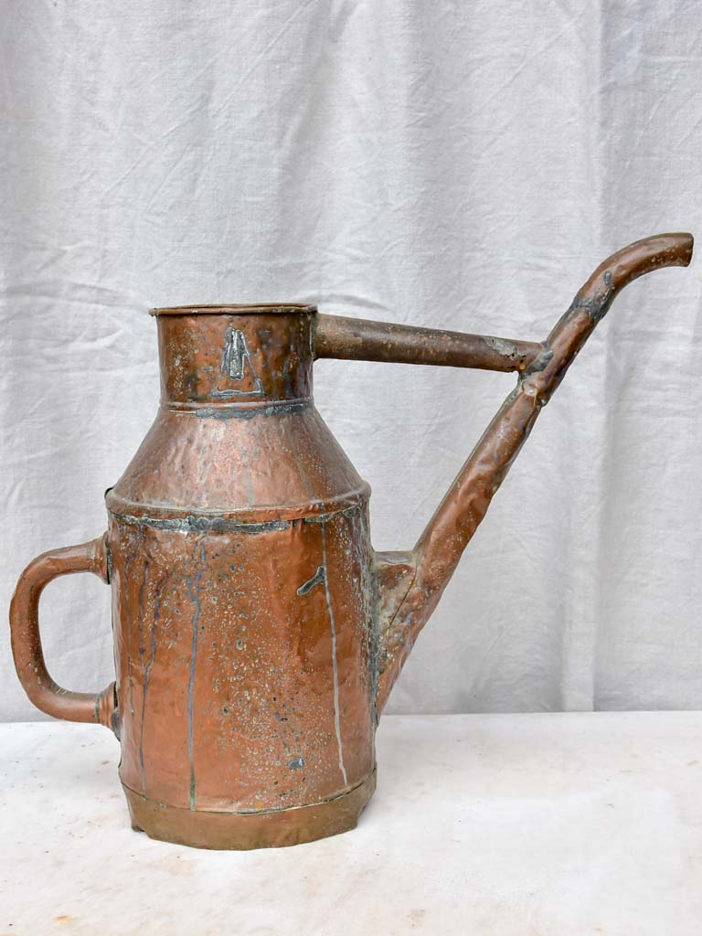 Rustic antique French copper watering can