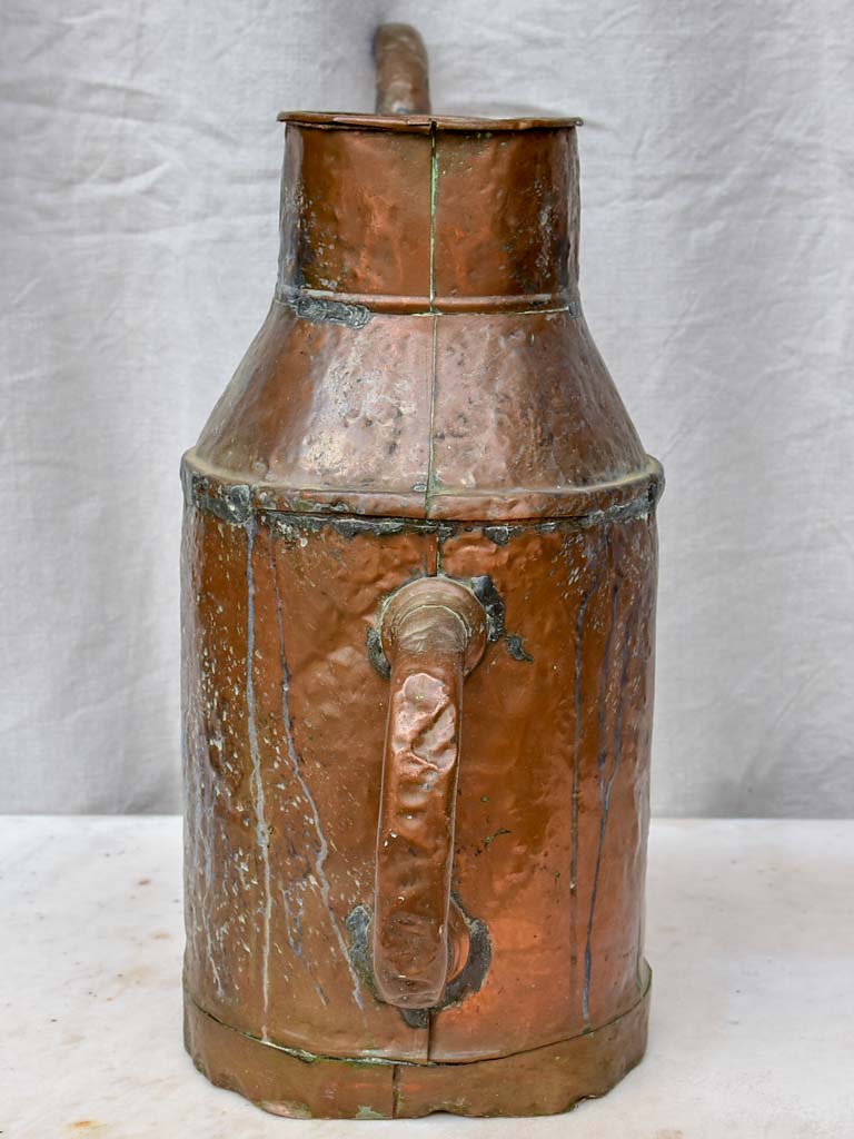 Rustic antique French copper watering can