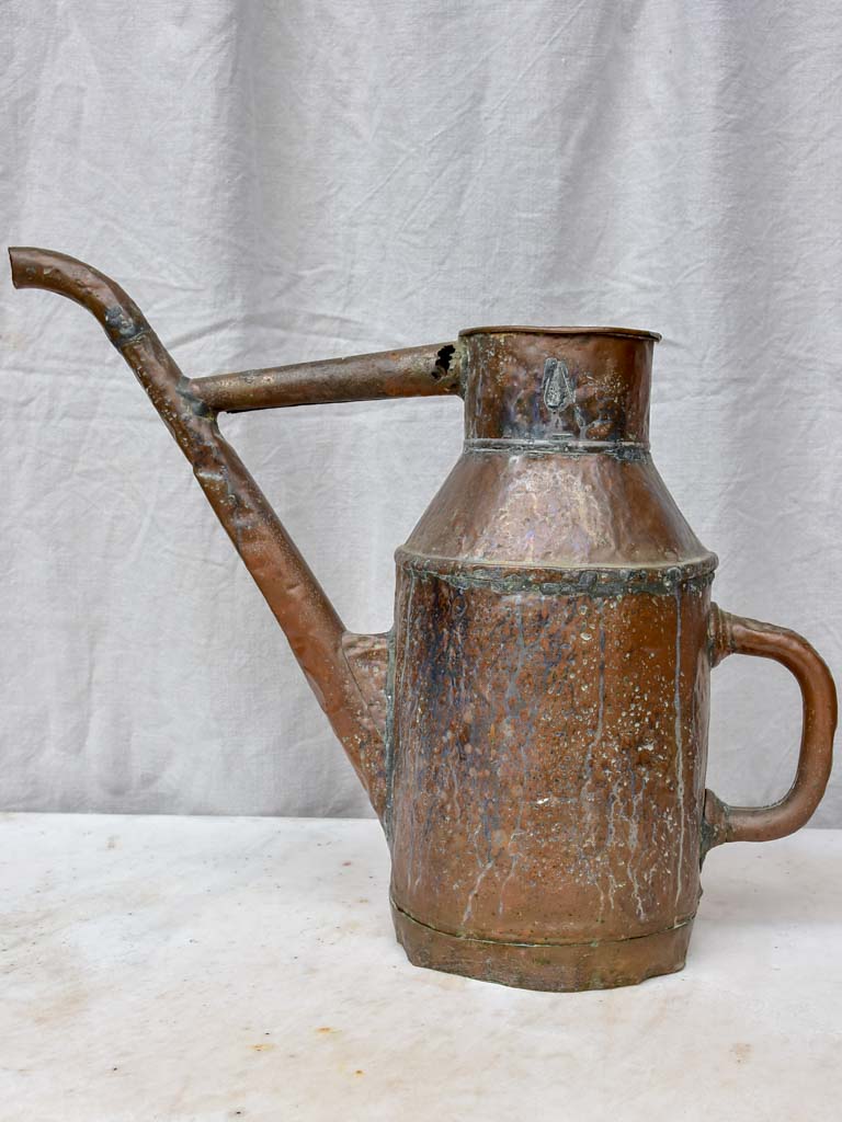 Rustic antique French copper watering can