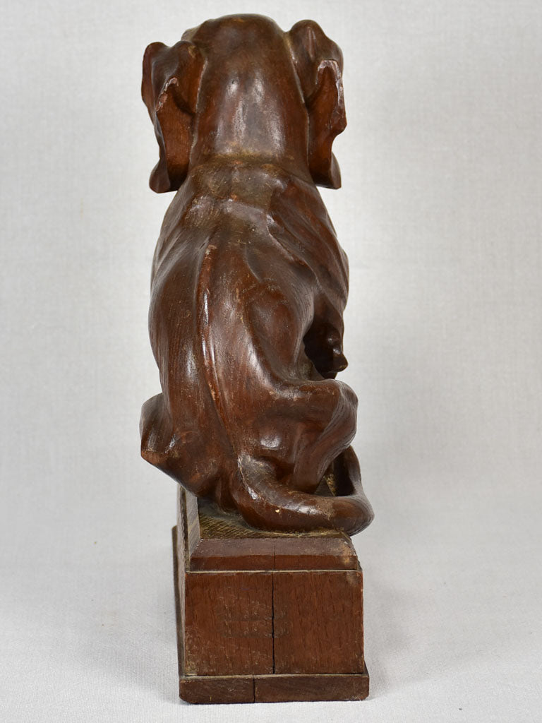 Rustic oak wood canine statue