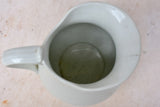 Antique white French pitcher