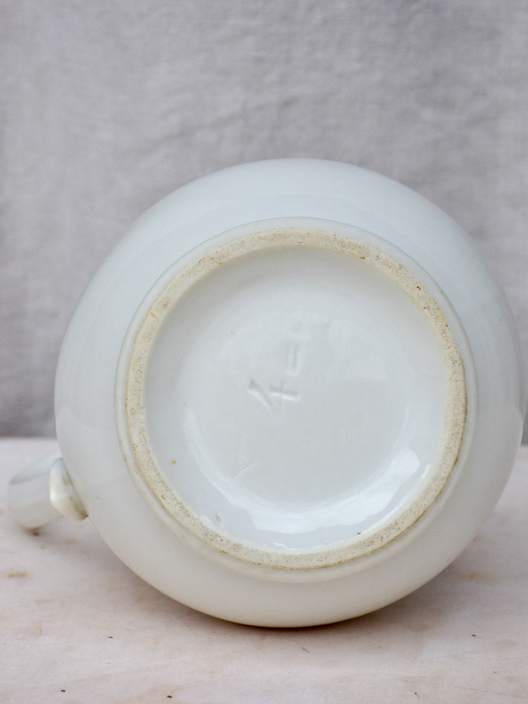 Antique white French pitcher