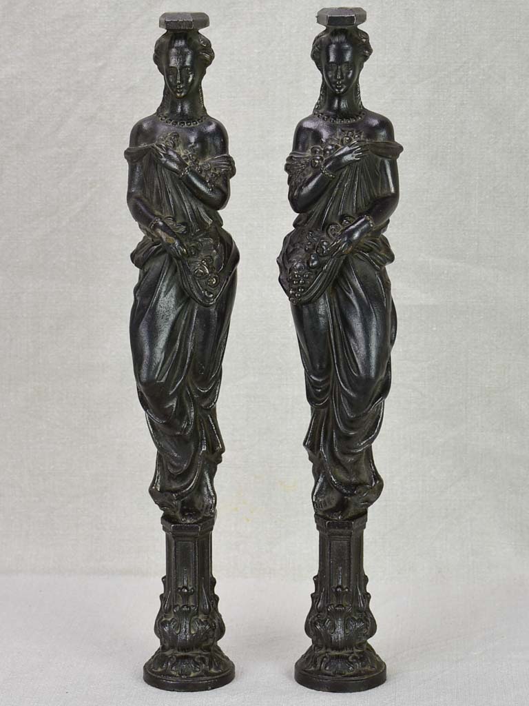 Pair of cast iron elements from a piece of furniture - caryatids 17¾"