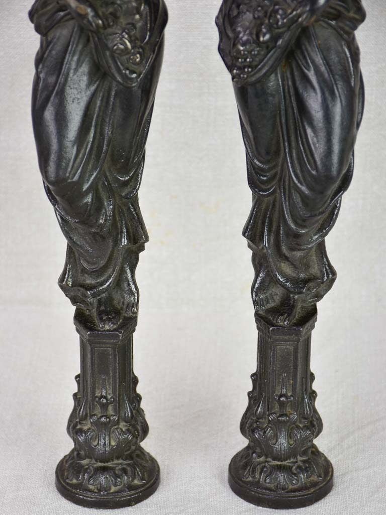 Pair of cast iron elements from a piece of furniture - caryatids 17¾"