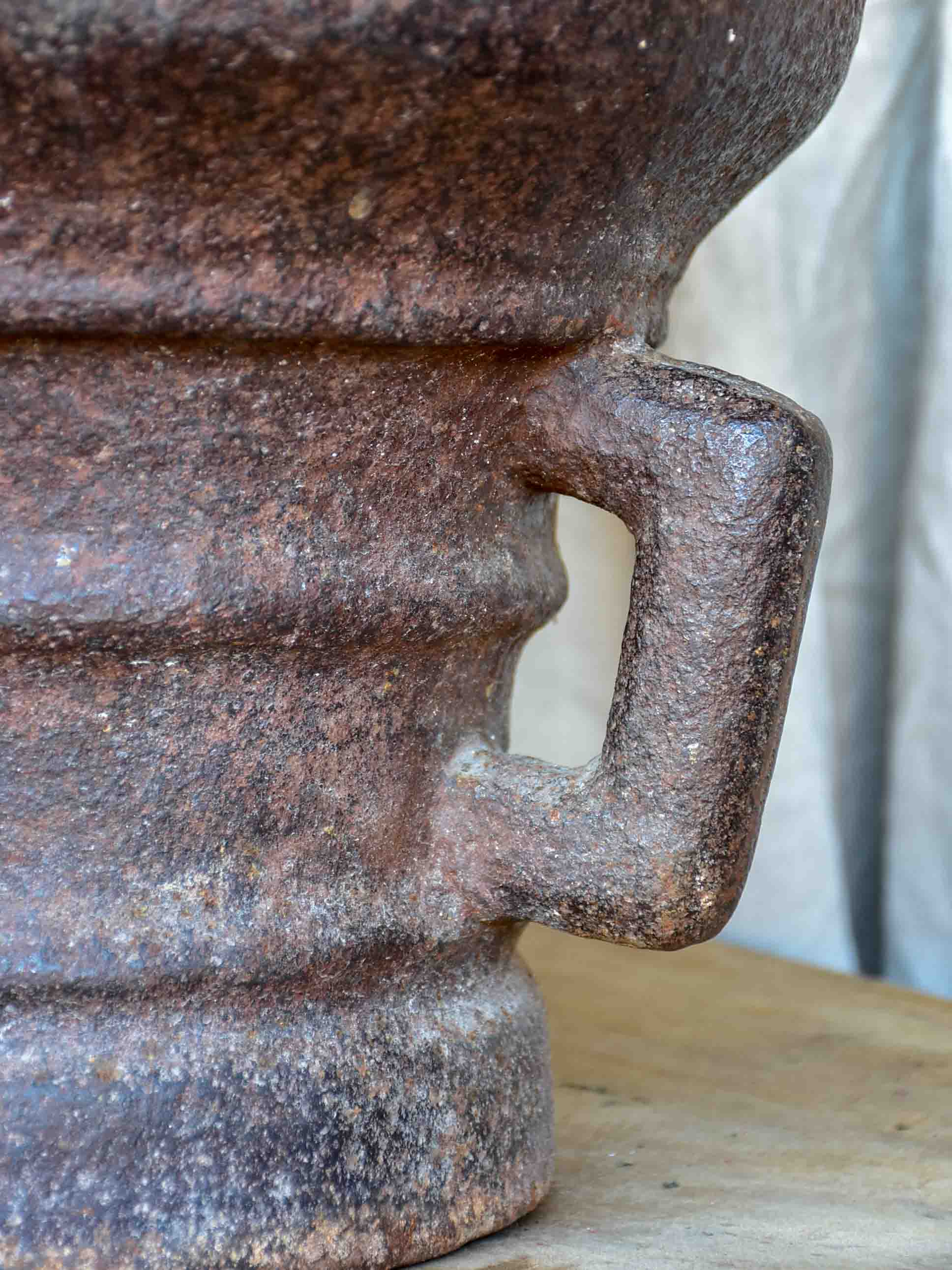 Antique iron mortar with bracket arms - European