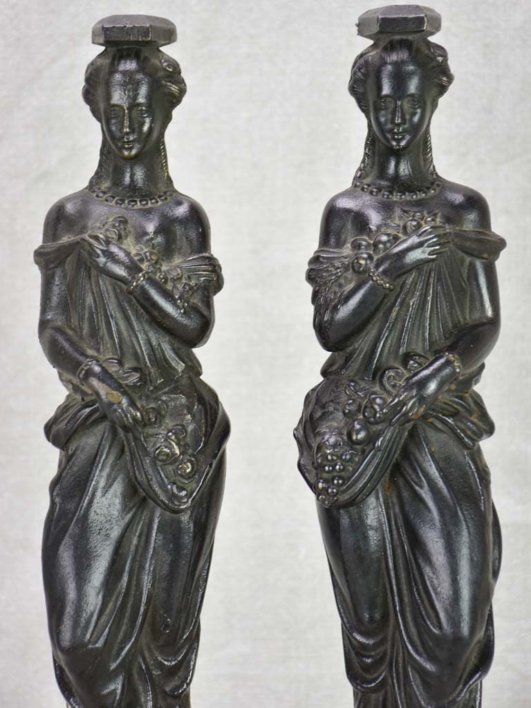 Pair of cast iron elements from a piece of furniture - caryatids 17¾"