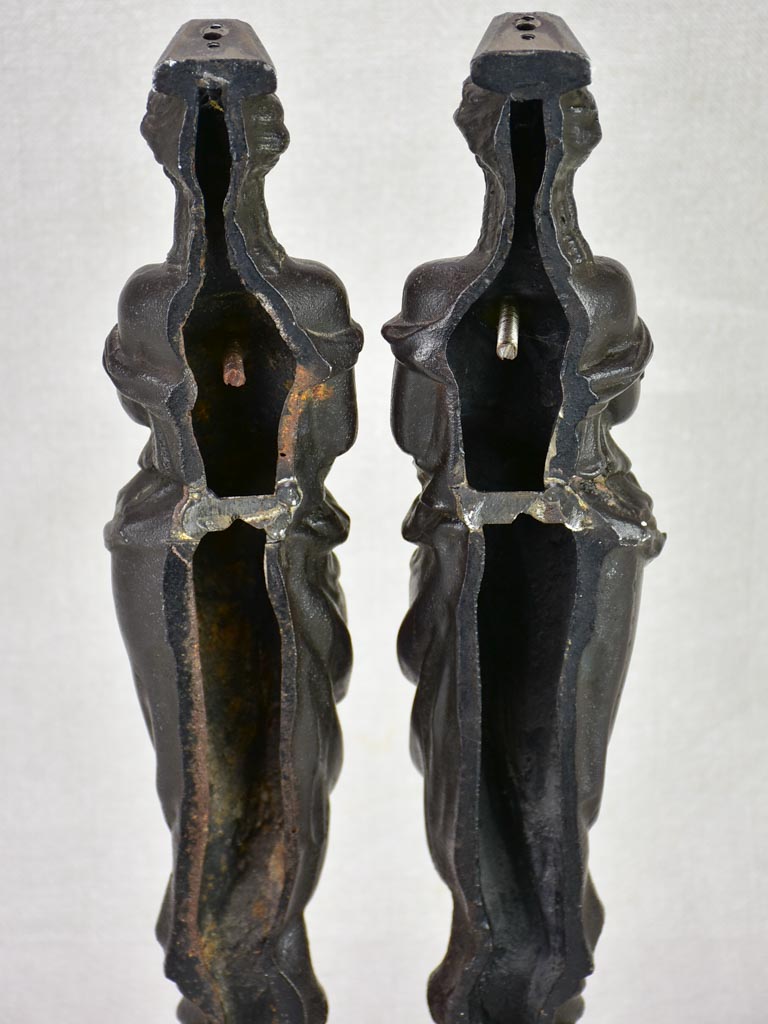 Pair of cast iron elements from a piece of furniture - caryatids 17¾"