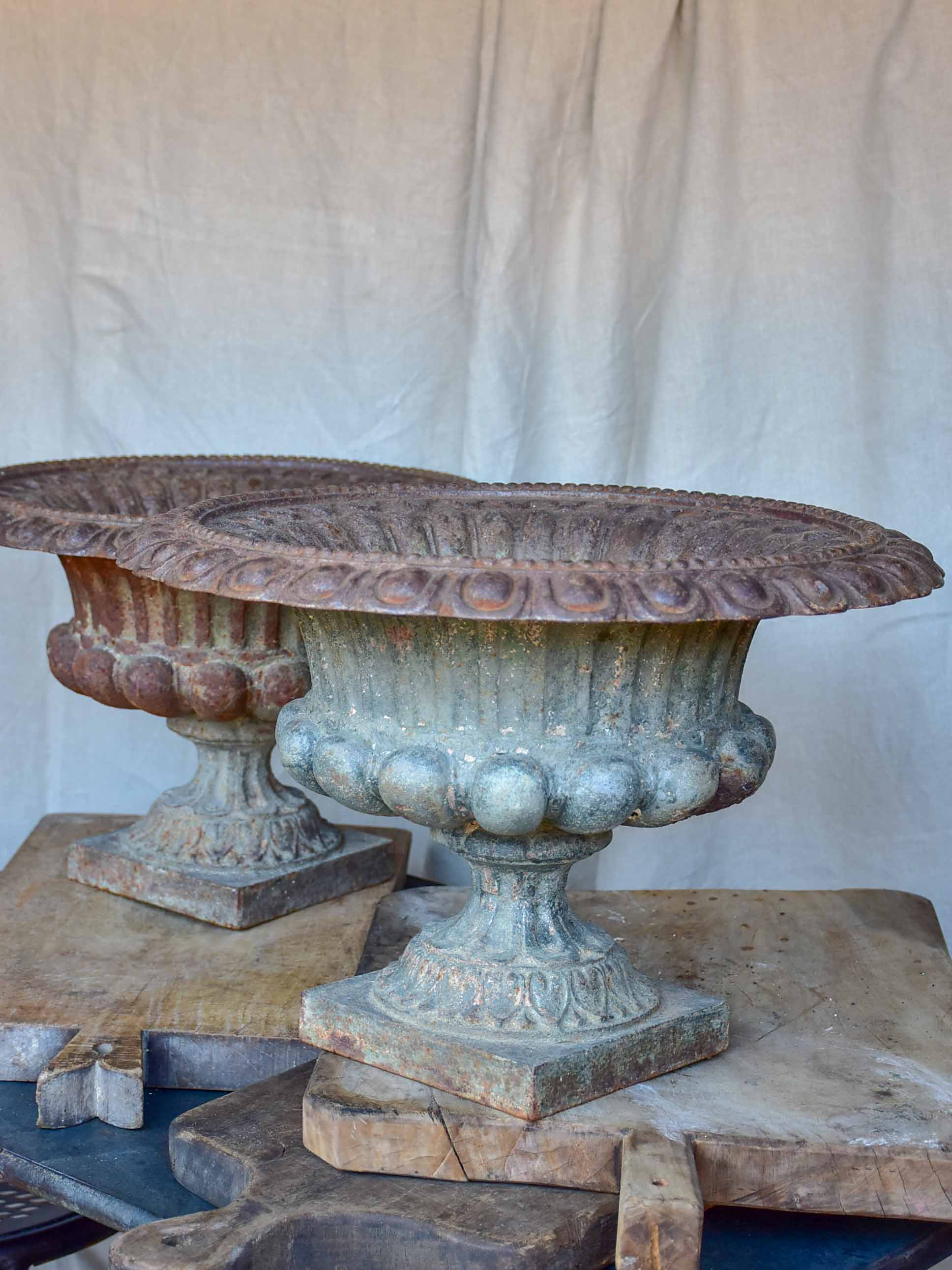 Pair of antique French cast iron urns