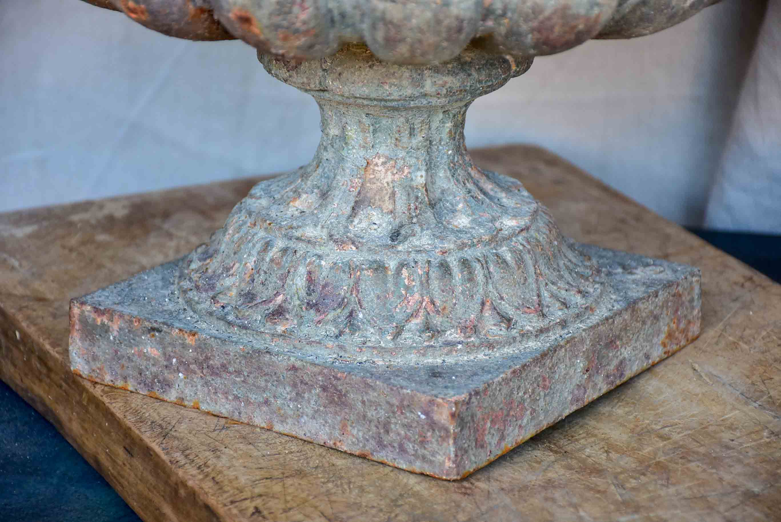 Pair of antique French cast iron urns