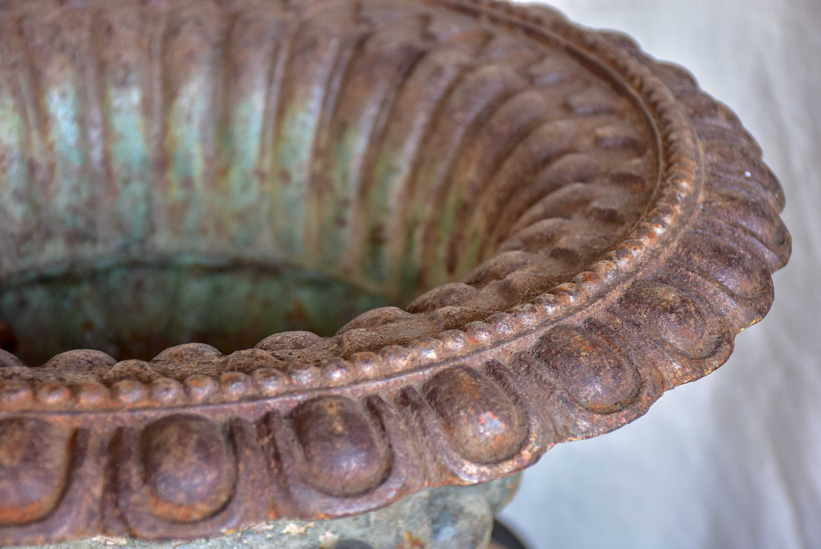 Pair of antique French cast iron urns