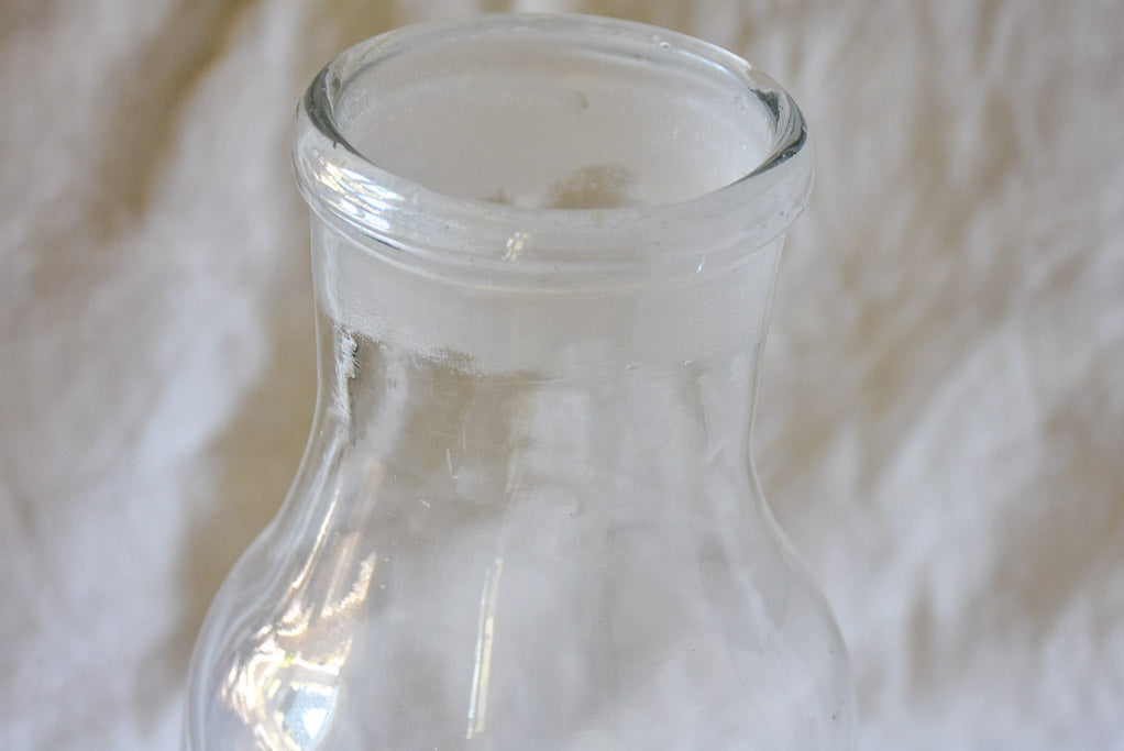 Antique French apothecary glass bottle with lid