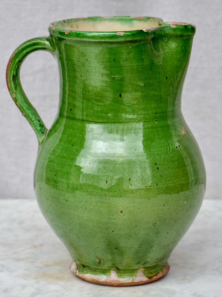 Antique French pitcher with green glaze