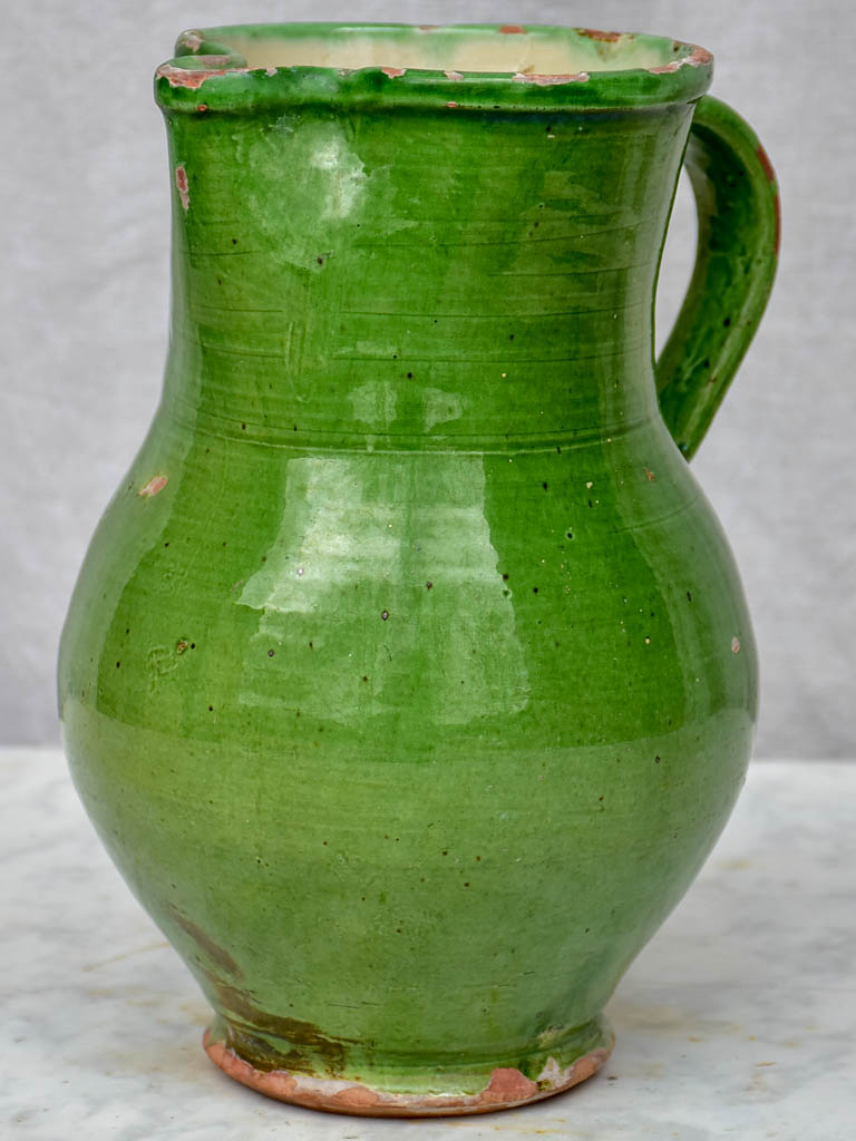 Antique French pitcher with green glaze