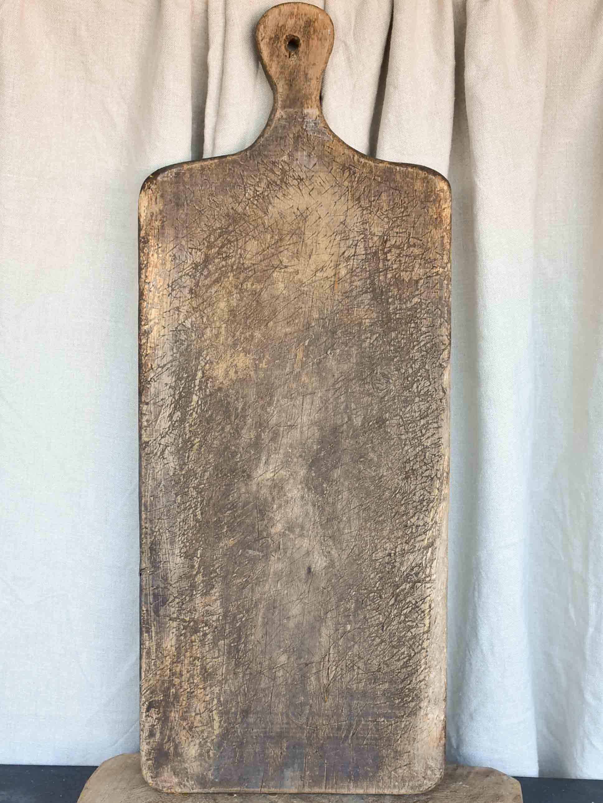 Very large antique French cutting board - puzzle piece silhouette  29 ½''