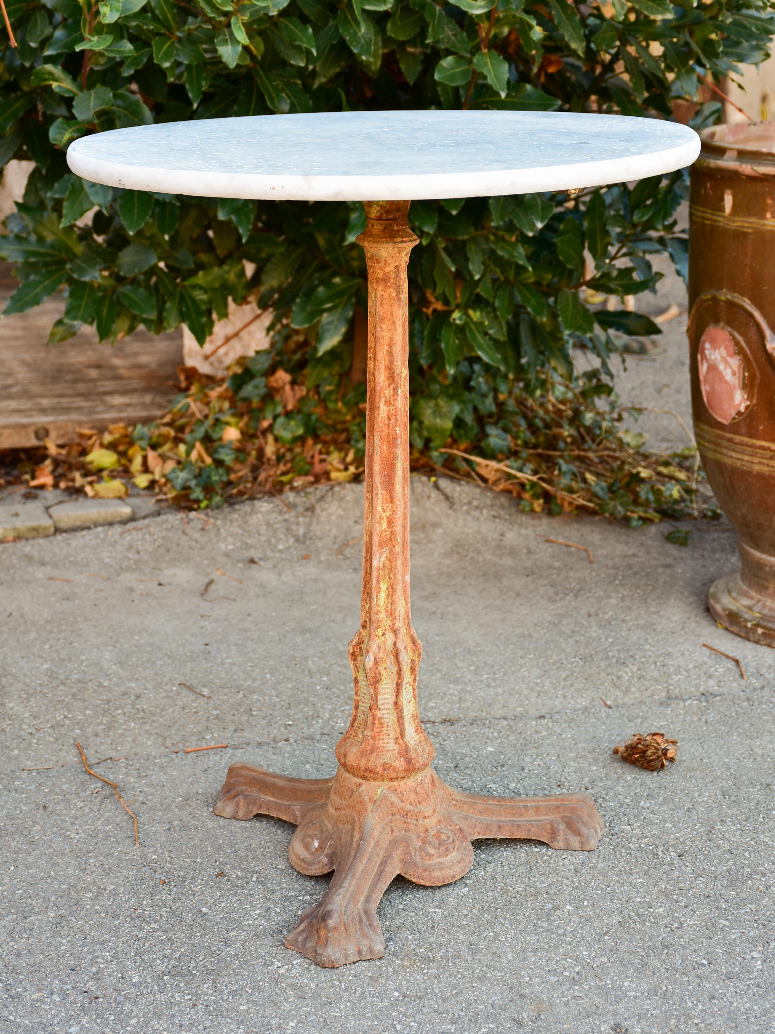 Antique Spanish bistro tables with marble tops