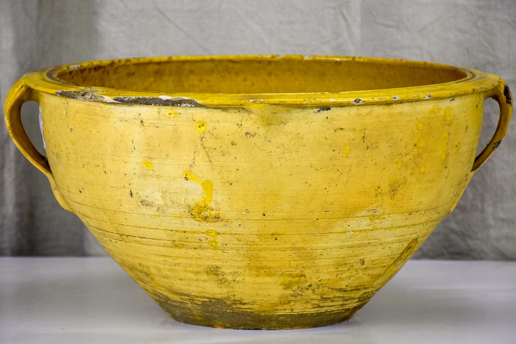 Large antique Spanish bowl with yellow glaze