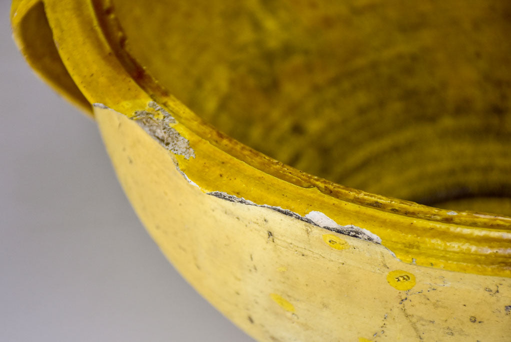 Large antique Spanish bowl with yellow glaze